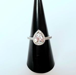 Halo pear engagement ring silver white